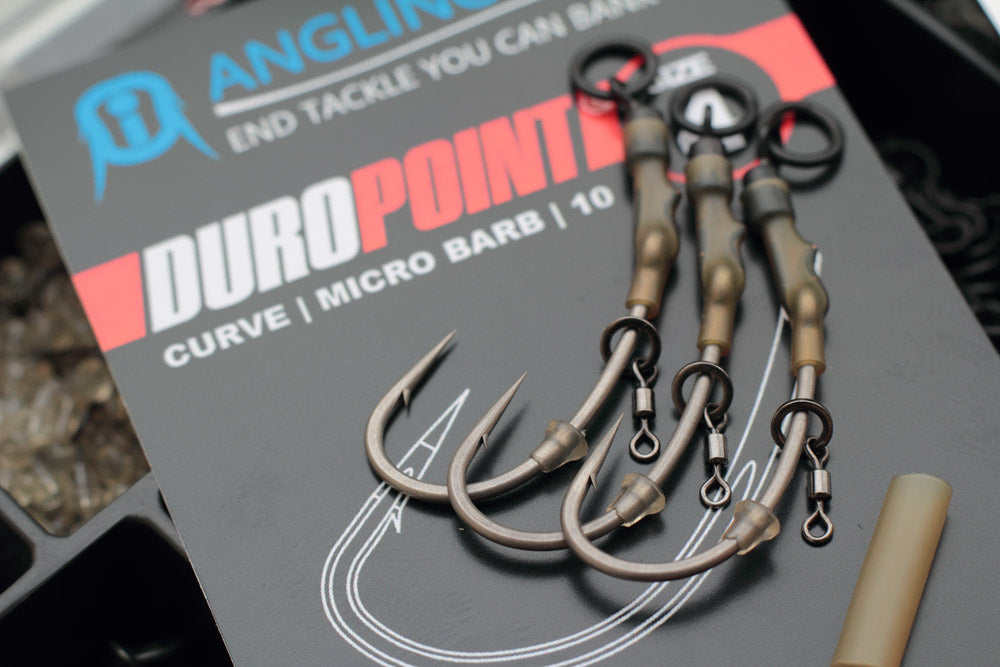 Angling Iron Duropoint Curve Shank is the best hook for the Ronnie rig or Spinner rig. Shown here is a size 4 Micro barbed with Trans khaki shrink tube, hook beads and micro hook ring swivels.  Also availble in barbless or kit form.