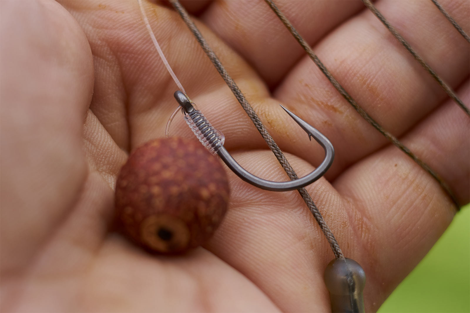 Here we've used a 6mm Cork plug to add buoyancy to this drilled out popup. The Chod rig is tied with a super sharp Size 4 Duropoint Chod hook and Revolve bristle filament.
