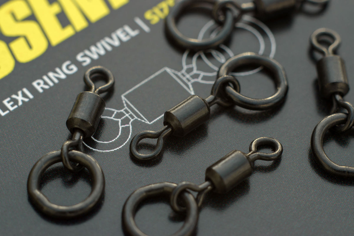 A close up showing Angling Iron essentials Size 11 Flexi Ring Swivels. used For many rigs inlcuding the Chod, Hinged stiff and 360 and an important piece of terminal tackle for Helicopter lead setups.
