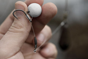 An Essentials micro hook ring swivel, bait attachment on a Hinged stiff rig.