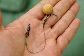A PVA simple bag rig tied to a Size 8 Flexi Ring swivel, with a Conti XS hook and Tufflex braid.