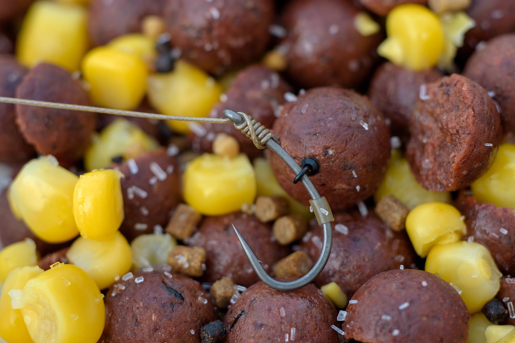 A Size 12 mini rig swivel used on a German rig with Trans khaki hook tubing and Duropoint curve shank hook.