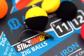 A 50/50 Zig rig made with two of the best colour Zig balls, yellow and black. A size 8 Duropoint Chod hook is the pattern of choice here with Trans green shrink tubing over the knotless Knot,.